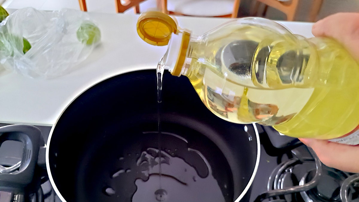 Adding oil to the pan