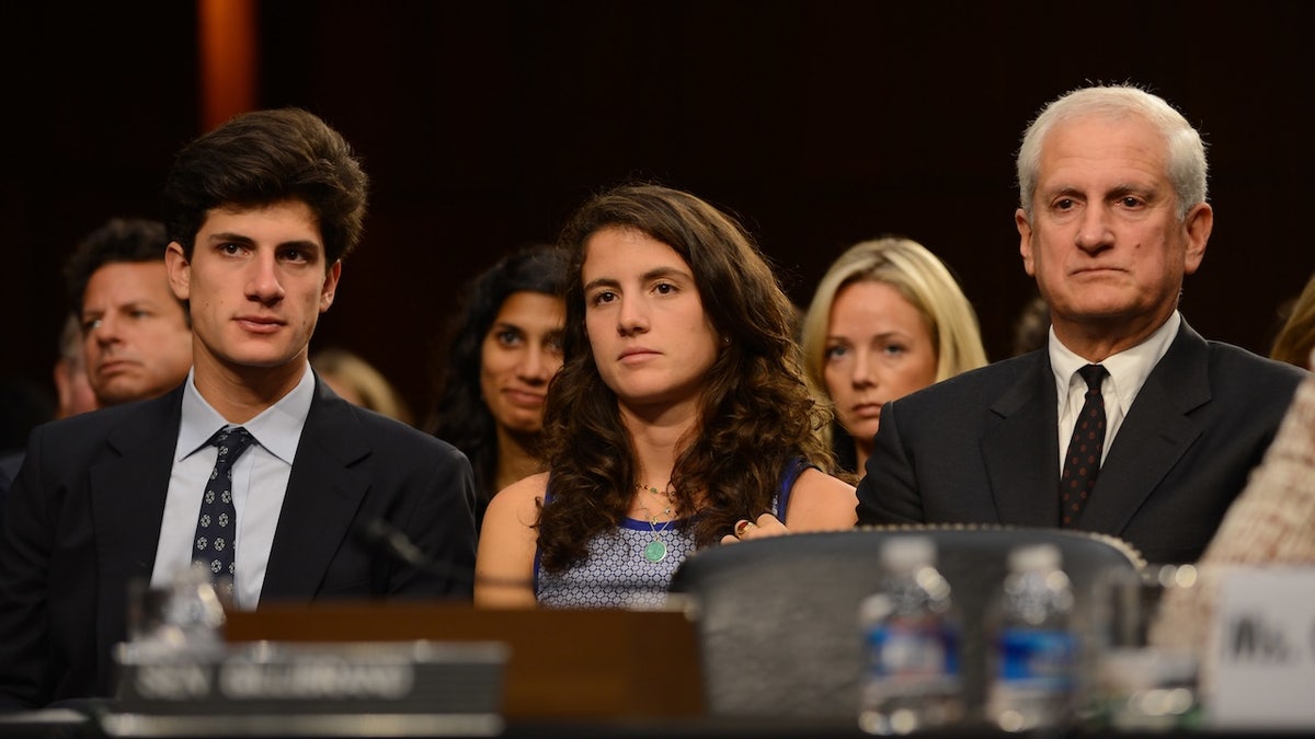 Tatiana Schlossberg with her brother and father
