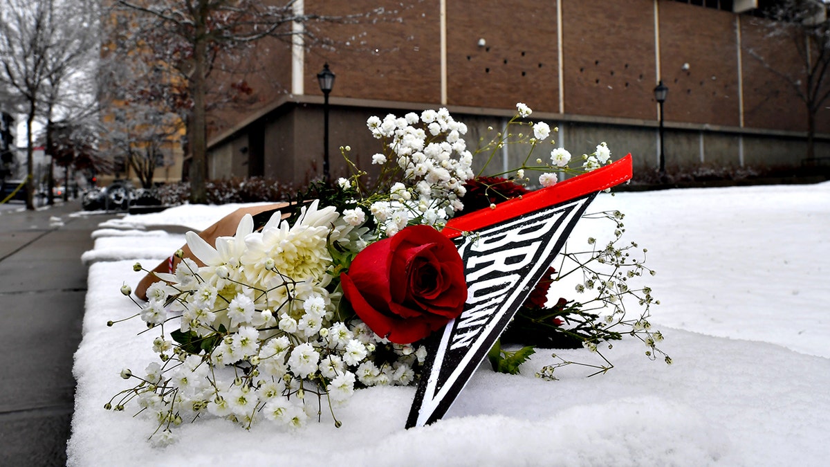 bouquet of flowers at makeshift memorial