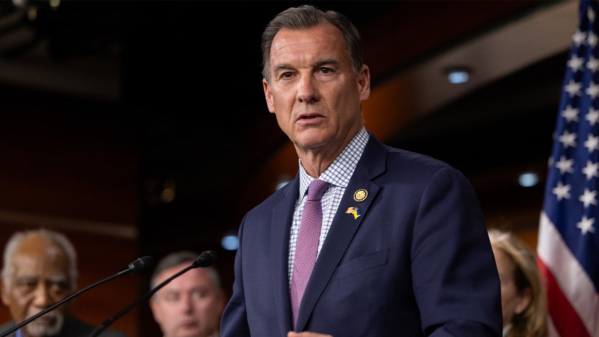 Rep Tom Suozzi at a press conference